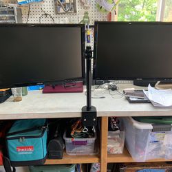 Two Monitors With Arm Stand