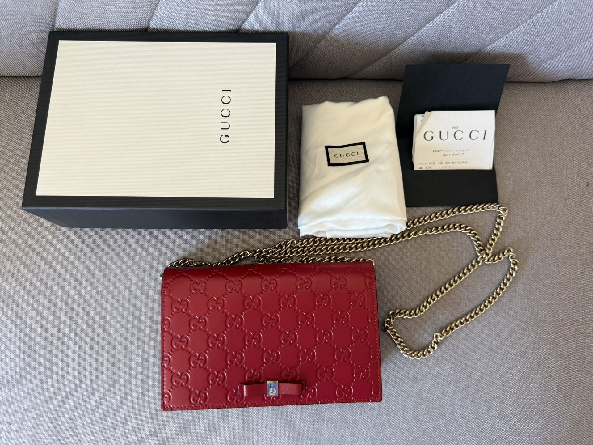 Authentic Gucci Guccissima Leather Signature Bow Mini Wallet on Chain – Hibiscus Red