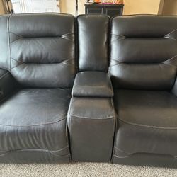 Dual power reclining loveseat with consol
