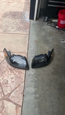 New edge 99-04 Mustang aftermarket headlight assembly