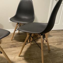 4 MODERN BLACK CHAIRS 