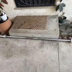 Olympic Bar With Clips 7 Foot Long 45 Lbs FIRM PRICE 