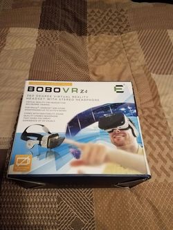 Brand new virual reality head set w/ head phones