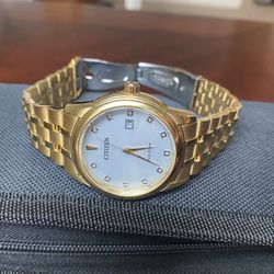 Slightly Used Citizen Corso Eco Drive. Gold-Tone. Diamonds. Runs on Light. Yours for $250 Cash
