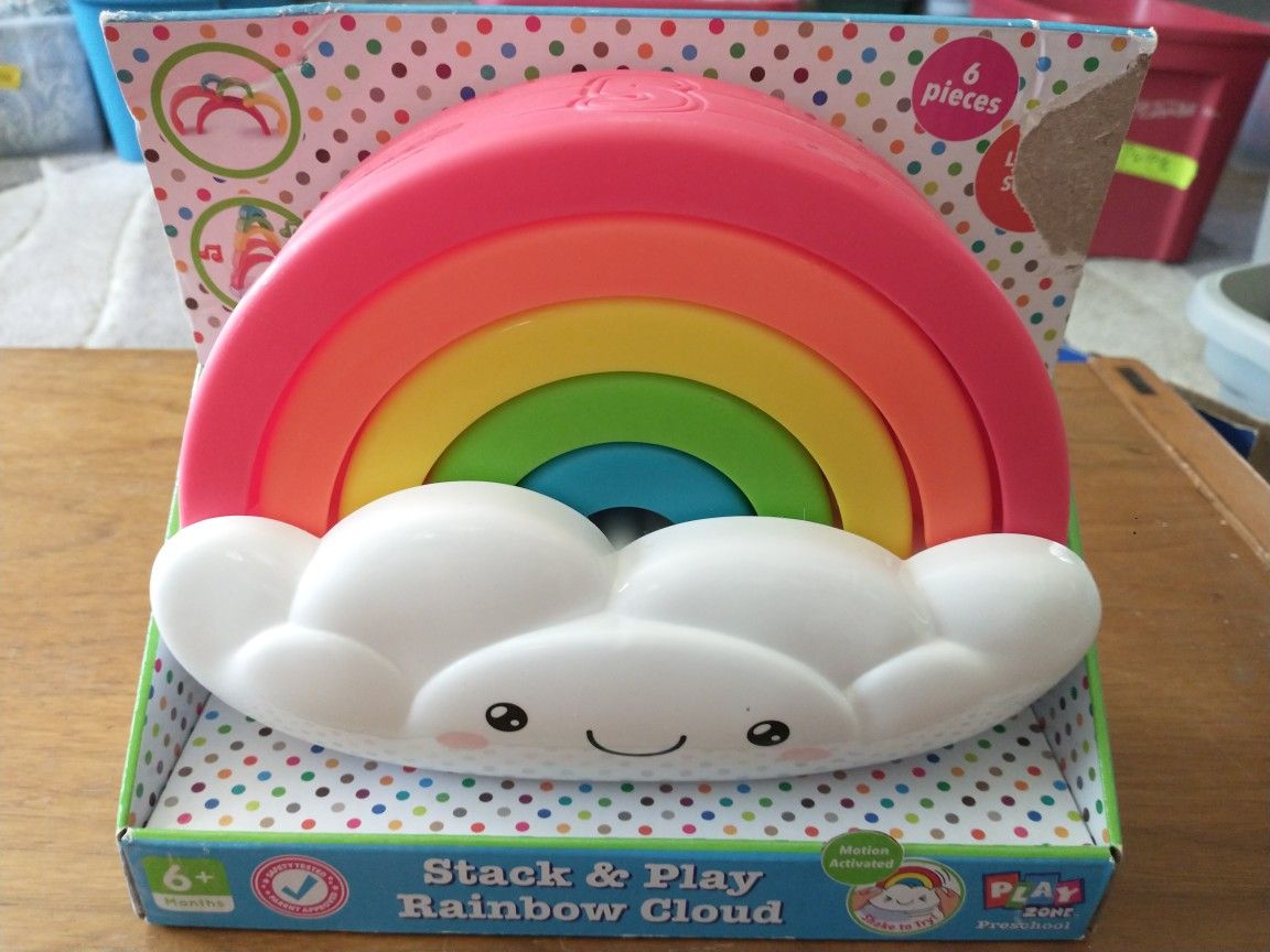 Stack & play rainbow cloud lights up and plays music ages 6+ motion activated

New