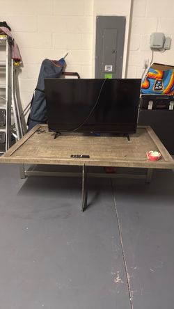 Coffee table with a bonus TV