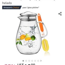 Glass Pitcher With Stainless Steel Lid.