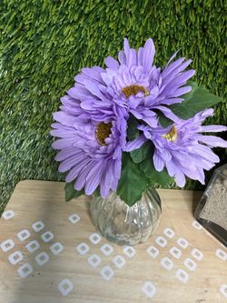 Purple flowers in vase