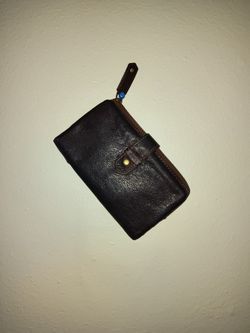 The Brand Is Fossil Genuine Leather 