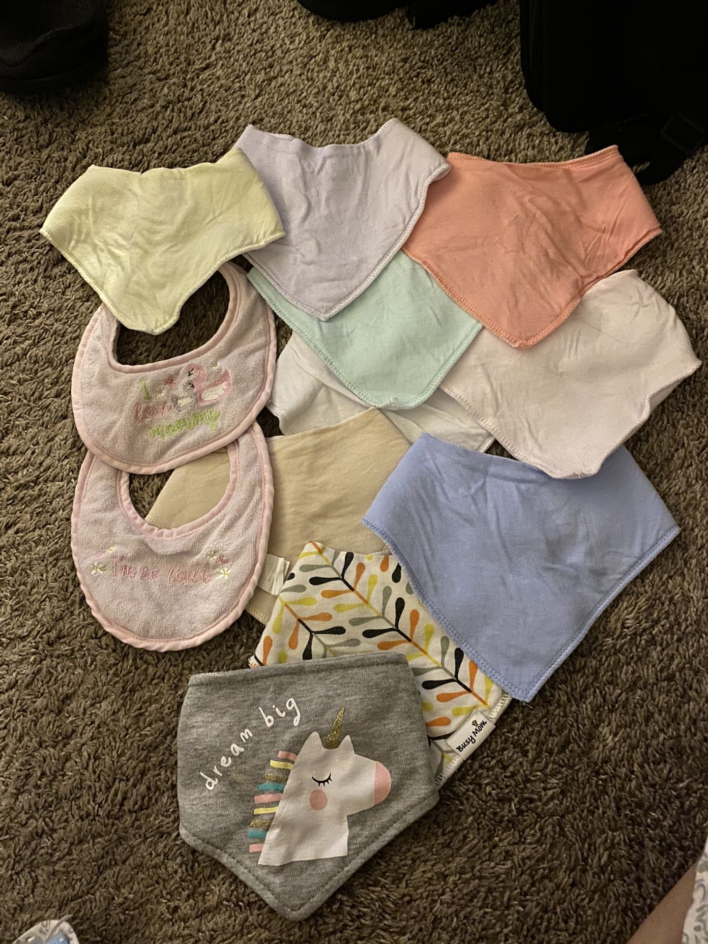 Lot of 15 barely used girl bibs