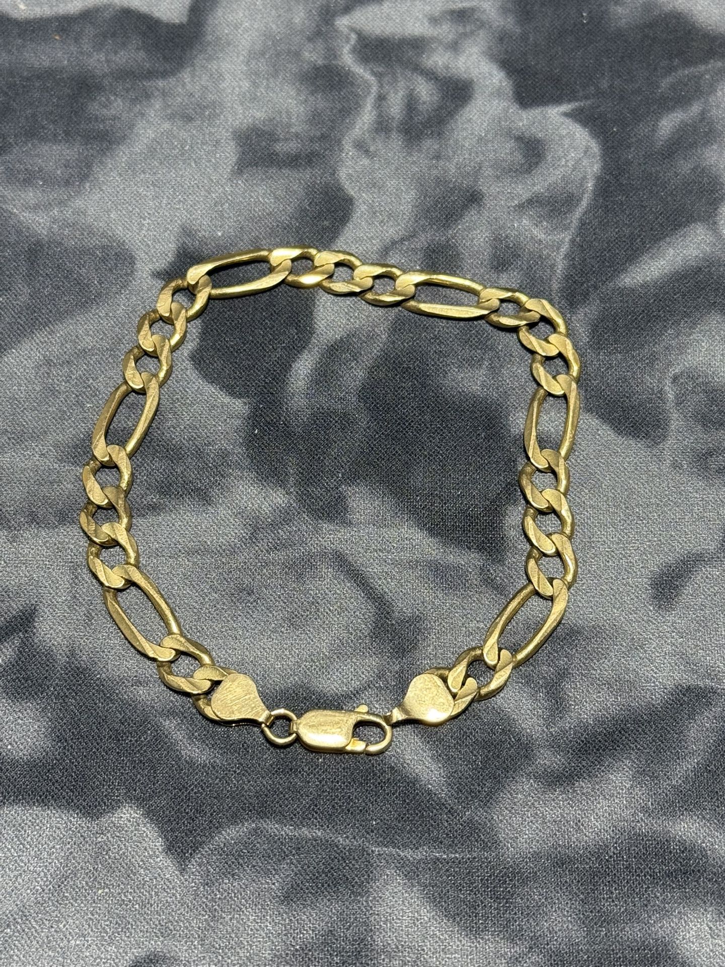 10k real gold bracelet   The 10k Scrap Gold Bracelet is a stunning piece of fine jewelry, featuring a lobster closure and crafted with excellent cut g