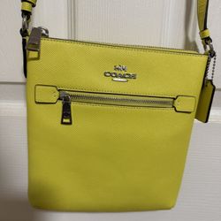 Coach yellow leather crossbody bag