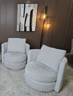 2  Matching Thomasville Davos Gray Swivel Chairs
EXCELLENT CONDITION