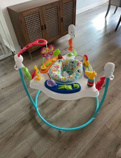 Fisher-Price Baby Bouncer Jumper Animal Activity Jumperoo With Music Lights Sounds And Developmental Toys For Infant