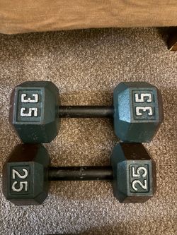 1 25lb and 1 35lb dumbell