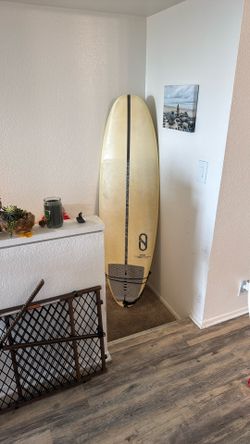 Slater designs Tomo Surfboard.