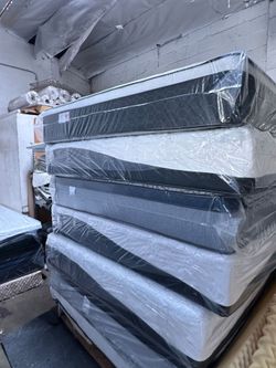 King Size Mattress Pillow Top 12"   new mattress in a,plastic sealed.   We offer same day delivery