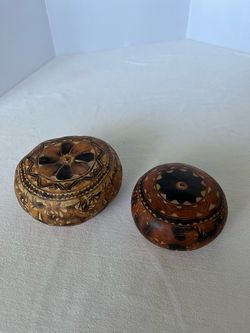 Two  Peruvian folk art carved gourd, known locally as a "mate burilado".