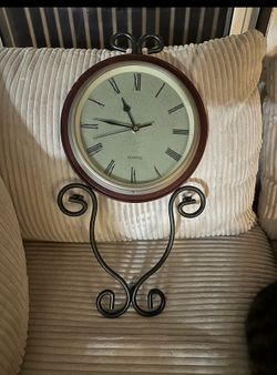 Reloj $20