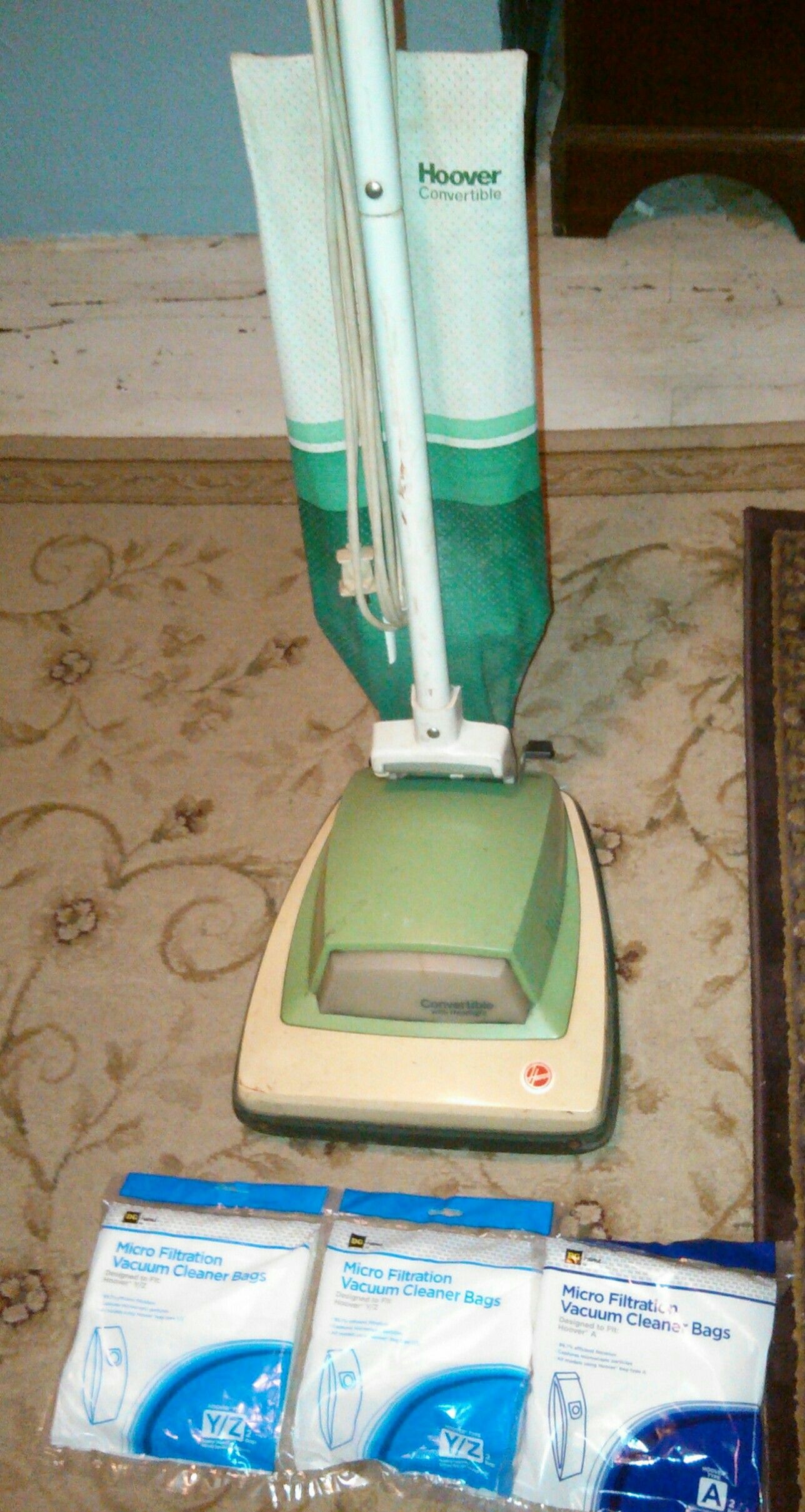 Hoover convertible vacuum with extra bag 40 takes it