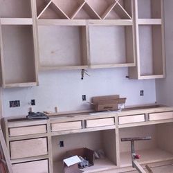 Custom cabinets and trim California Closets Laminate Finish