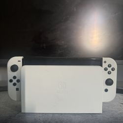 Nintendo Switch OLED + Pro Controller