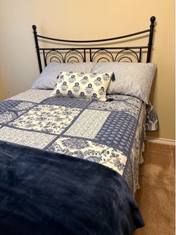 Full size wrought iron bed with mattress