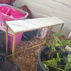 Gold and faux marble entry table 
