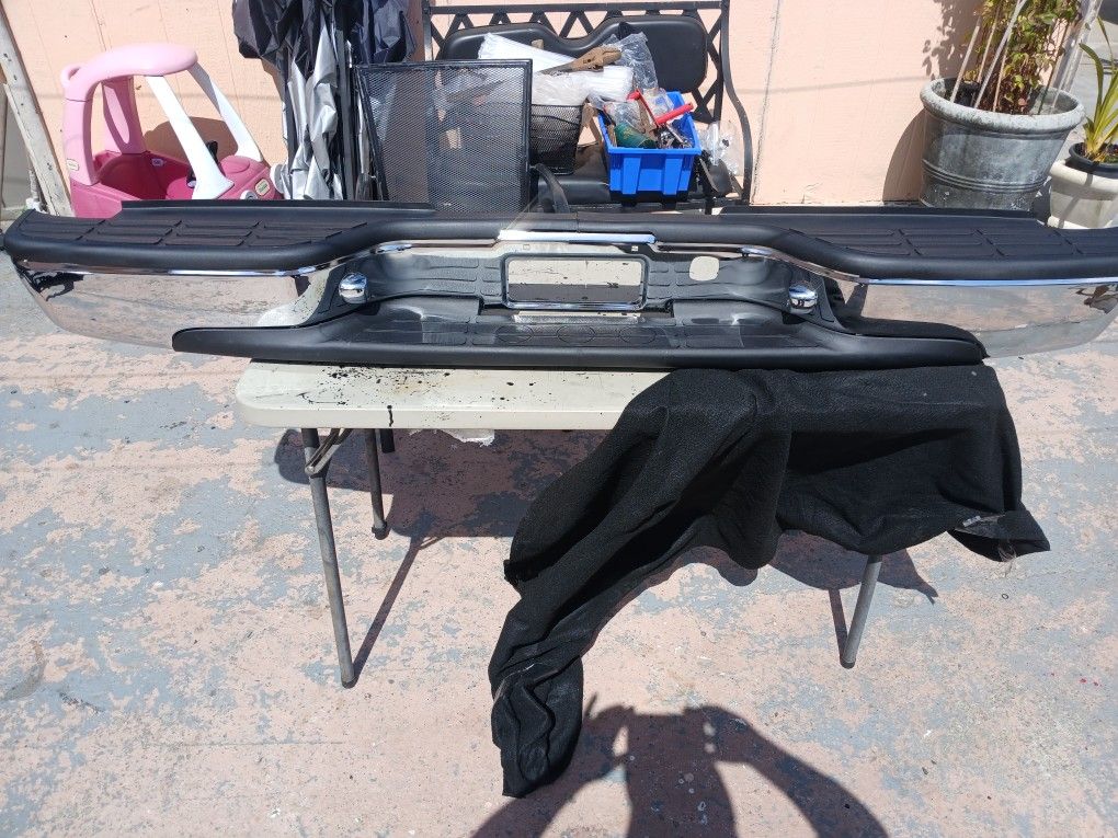 BRAND NEW OUT THE BOX. 1(contact info removed) CHEVY SILVERADO/ GMC SIERRA REAR CHROME STEEL BUMPER