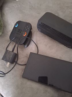 Nintendo switch 2 and controller and charger dock