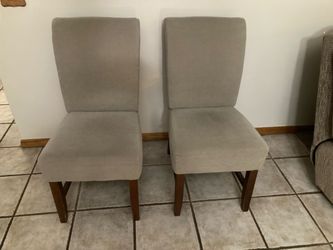 Two cloth medium tan Chairs