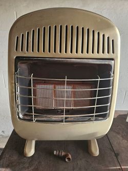 20,000 BTU DUEL FUEL PROPANE OR NATURAL GAS 3 PLACK HEATER THERMOSTAT CONTROLED WITH BLOWER