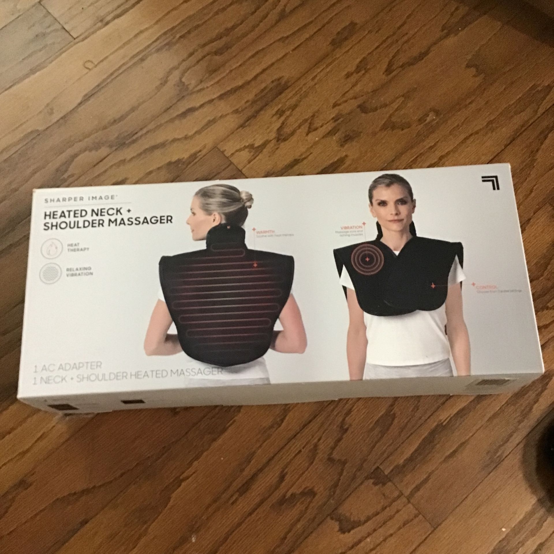 Heated neck massager