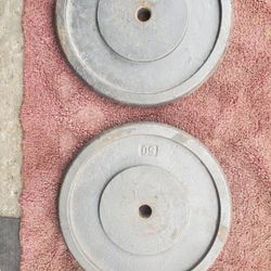1" HOLE  50lb PLATES. TOTAL 100LBs 
7111.S WESTERN WALGREENS 

$100  CASH ONLY AS IS