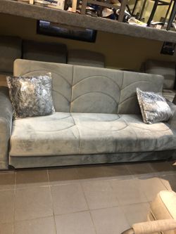 Sofa bed with matching love seat. Bed $1 down no credit check