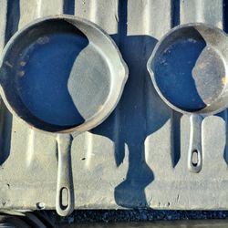 Two Small Iron Skillets