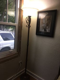 Floor lamp with foot dimmer switch.