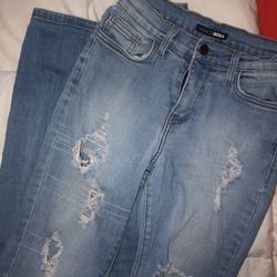 Fashion Nova High Waist Ripped Jeans 24