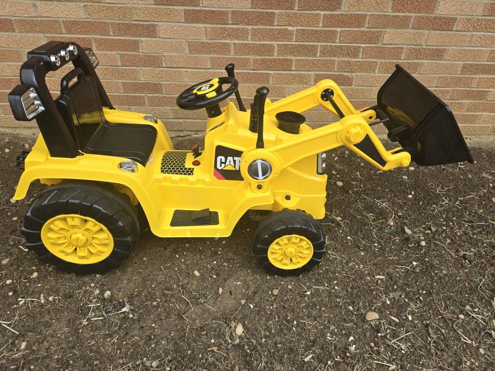 Cat Tractor Bull Dozer Digger Ride-On Toy by Kid Trax 60 lb limit