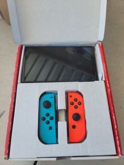 Nintendo switch oled un juego troll land  no cargador