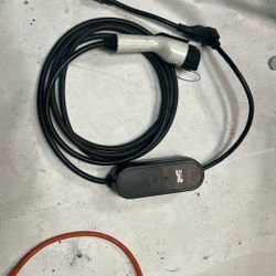 Electronic vehicle charger with adapter