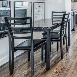 Marbled Black Dining Table And Chairs