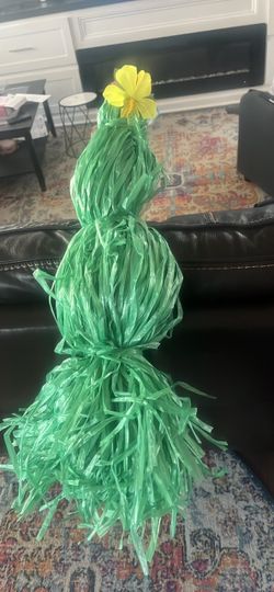 Random birthday decor including Hawaiian table skirt