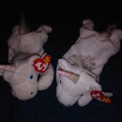 2x Mystic unicorn beanie babies with different tag info.
