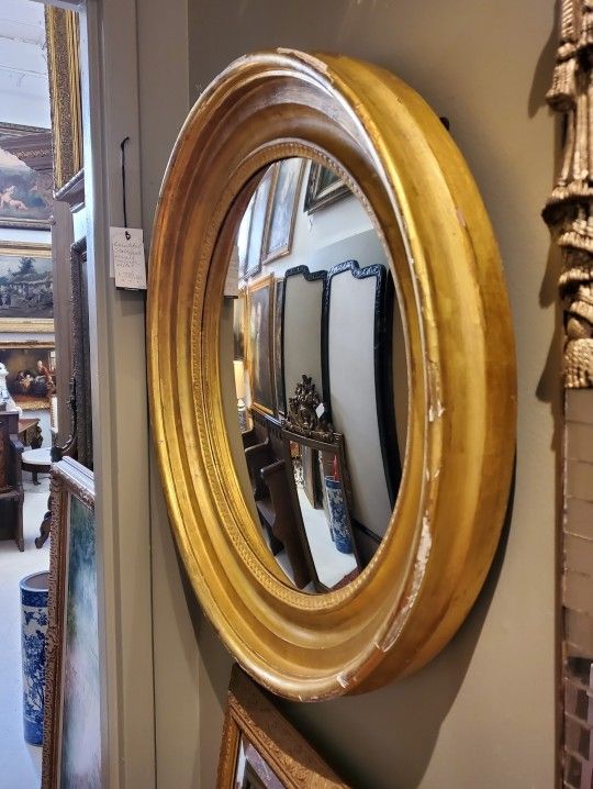 Regency convex wall mirror, circa 1820