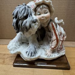Used Porcelain G Armani Figurine