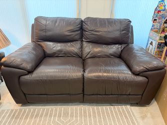 Two Leather Reclining Sofas