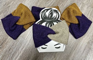 Knitted purple and gold headband.