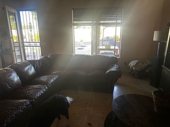 Free leather sectional couch.   Some life left in it.