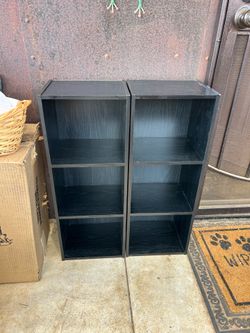 Pair of 3 shelf black bookcases